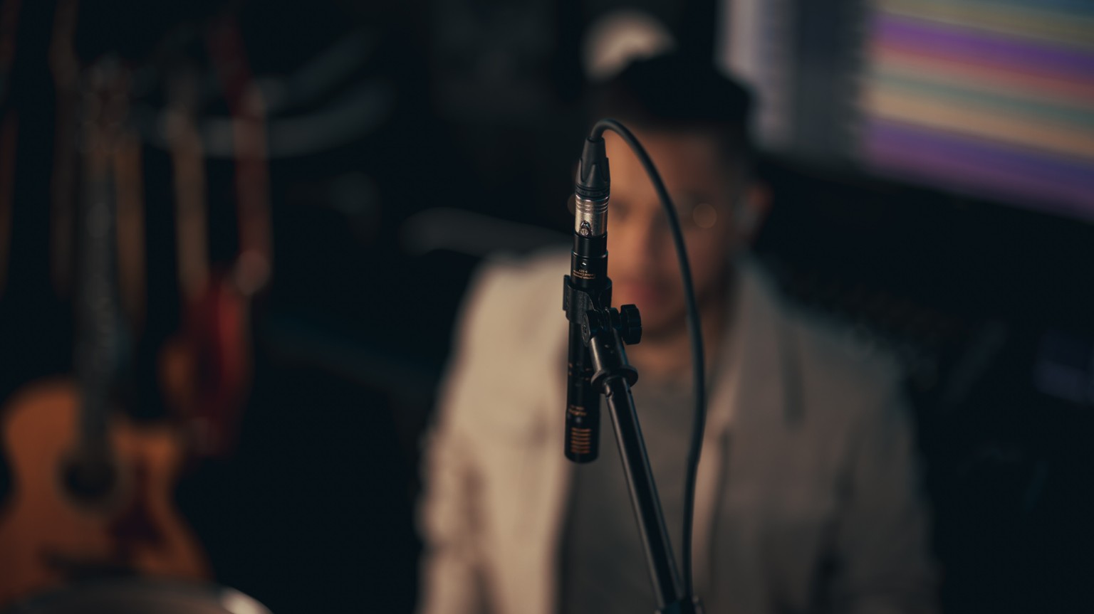 Close-up of an Audix microphone positioned over Kevin Michael Chong's drum kit